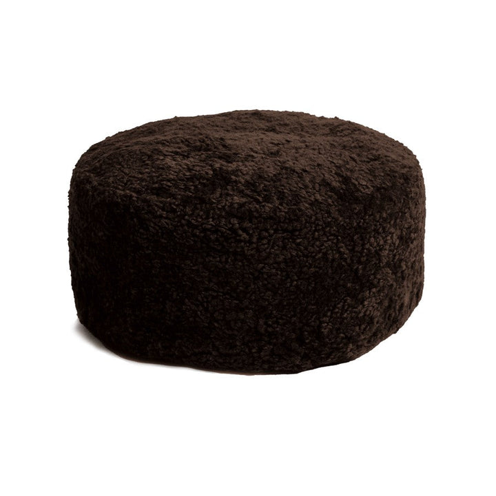 The Sheepskin Sculptural Ottoman – Curly Edition
