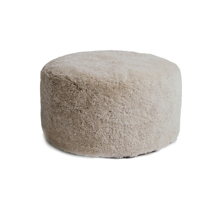The Sheepskin Sculptural Ottoman – Curly Edition