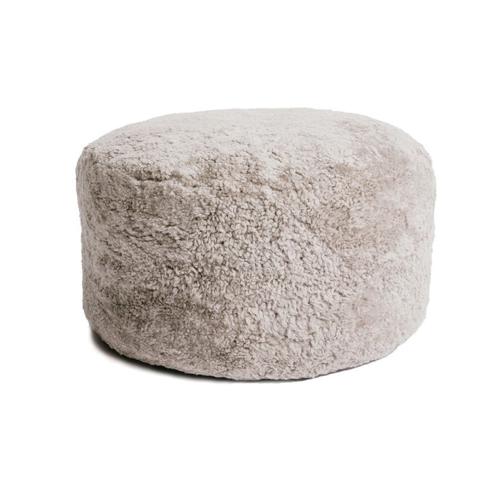 The Sheepskin Sculptural Ottoman – Curly Edition